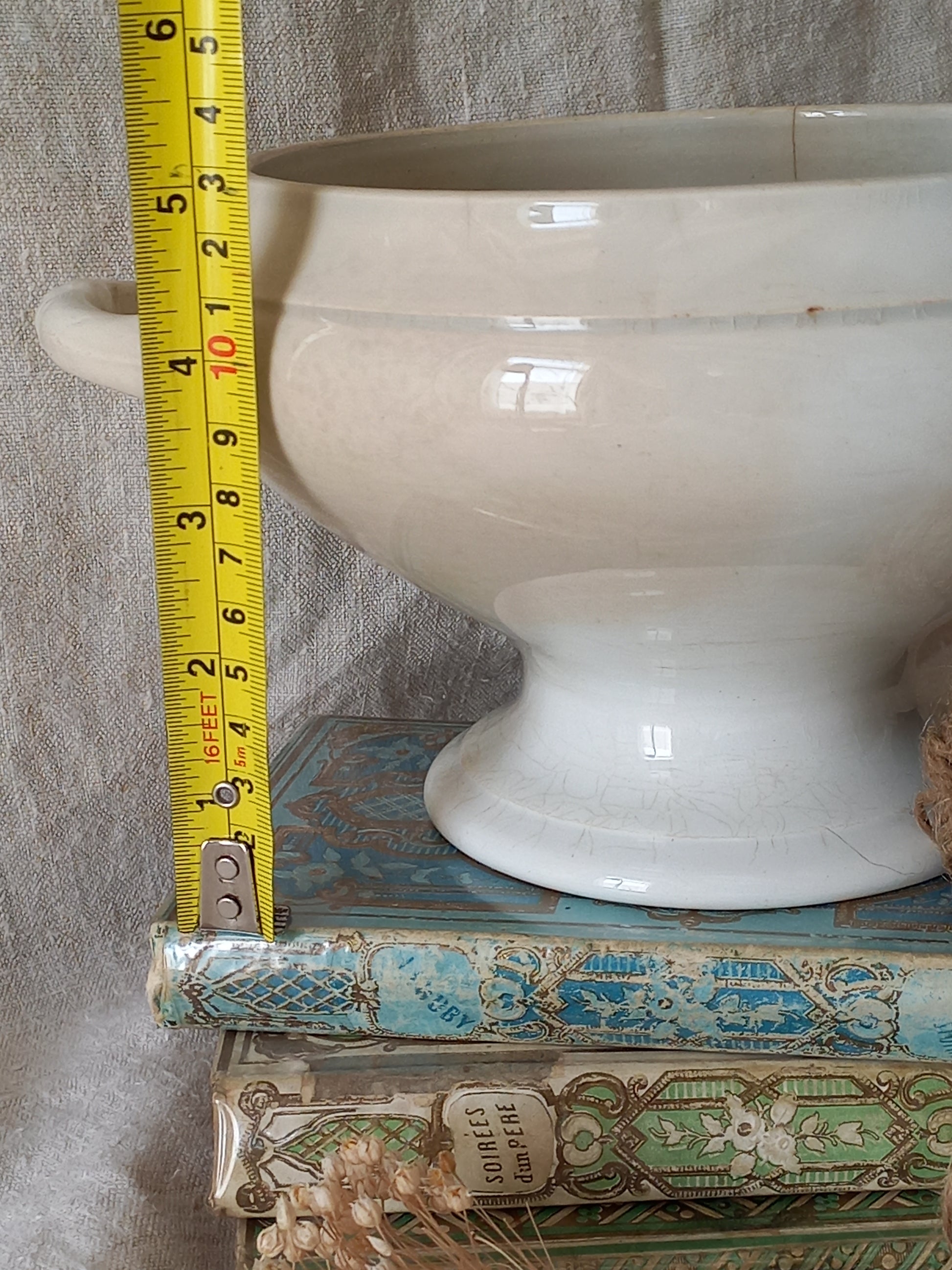 White ironstone bowl with a tape measure for reference.