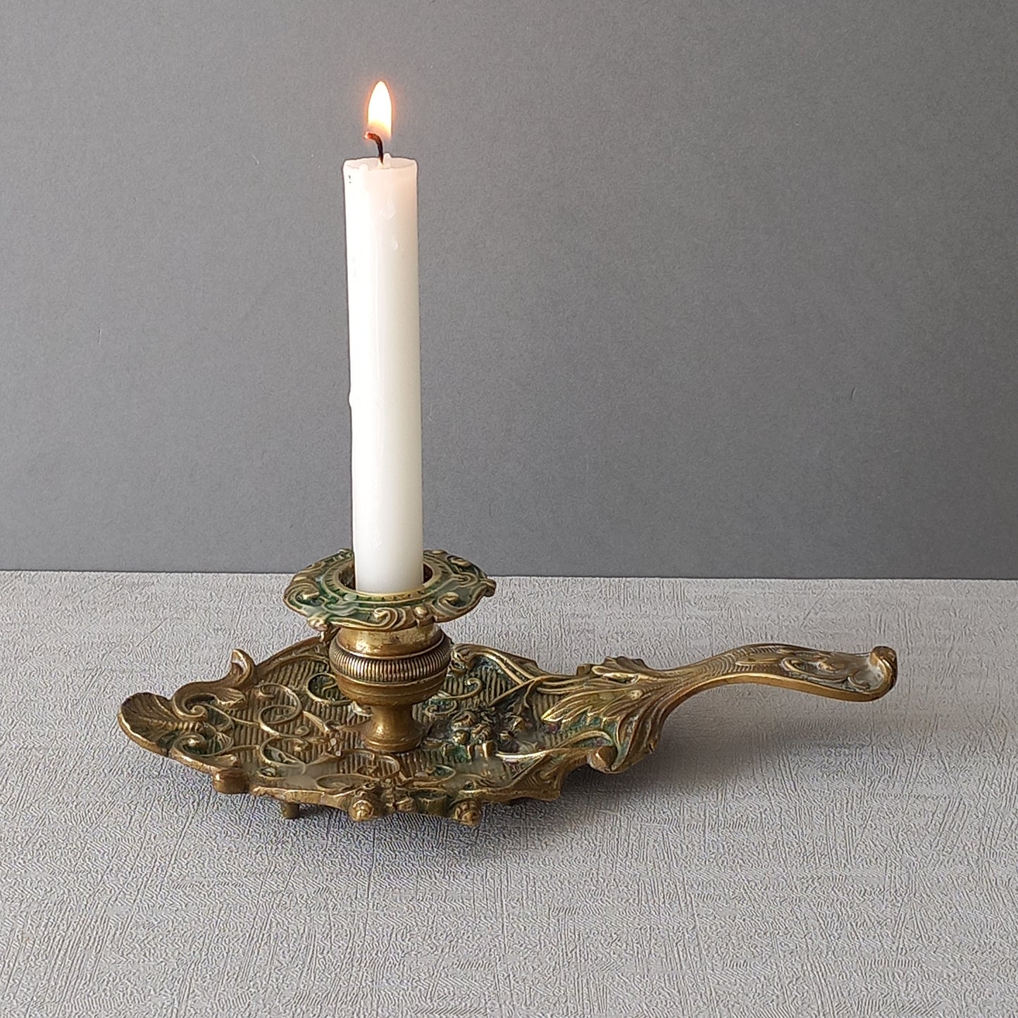 An original French art nouveau brass chamber stick, a small and decorative antique candle holder that will be a welcome addition to any interior.