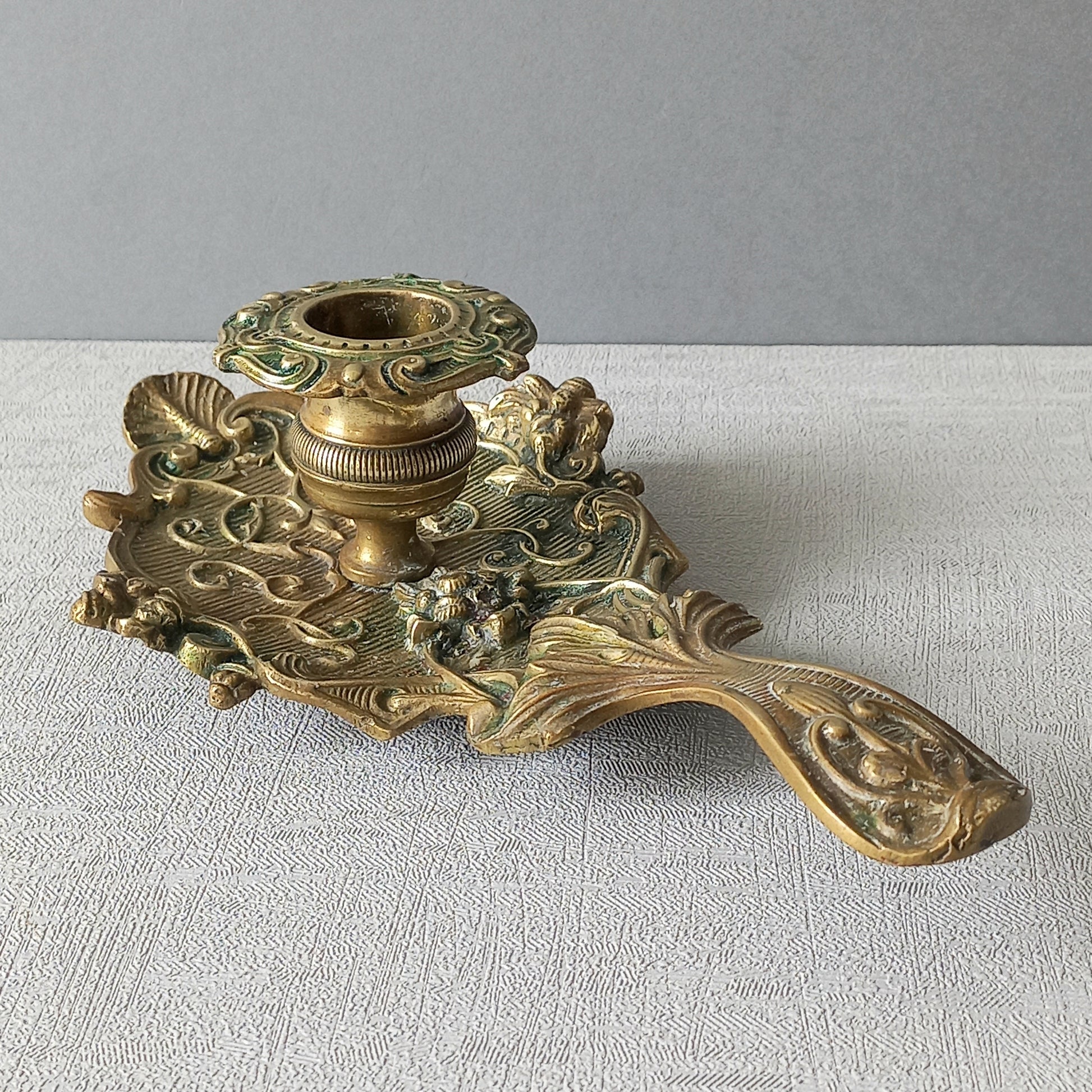 An original French art nouveau brass chamber stick, a small and decorative antique candle holder that will be a welcome addition to any interior.