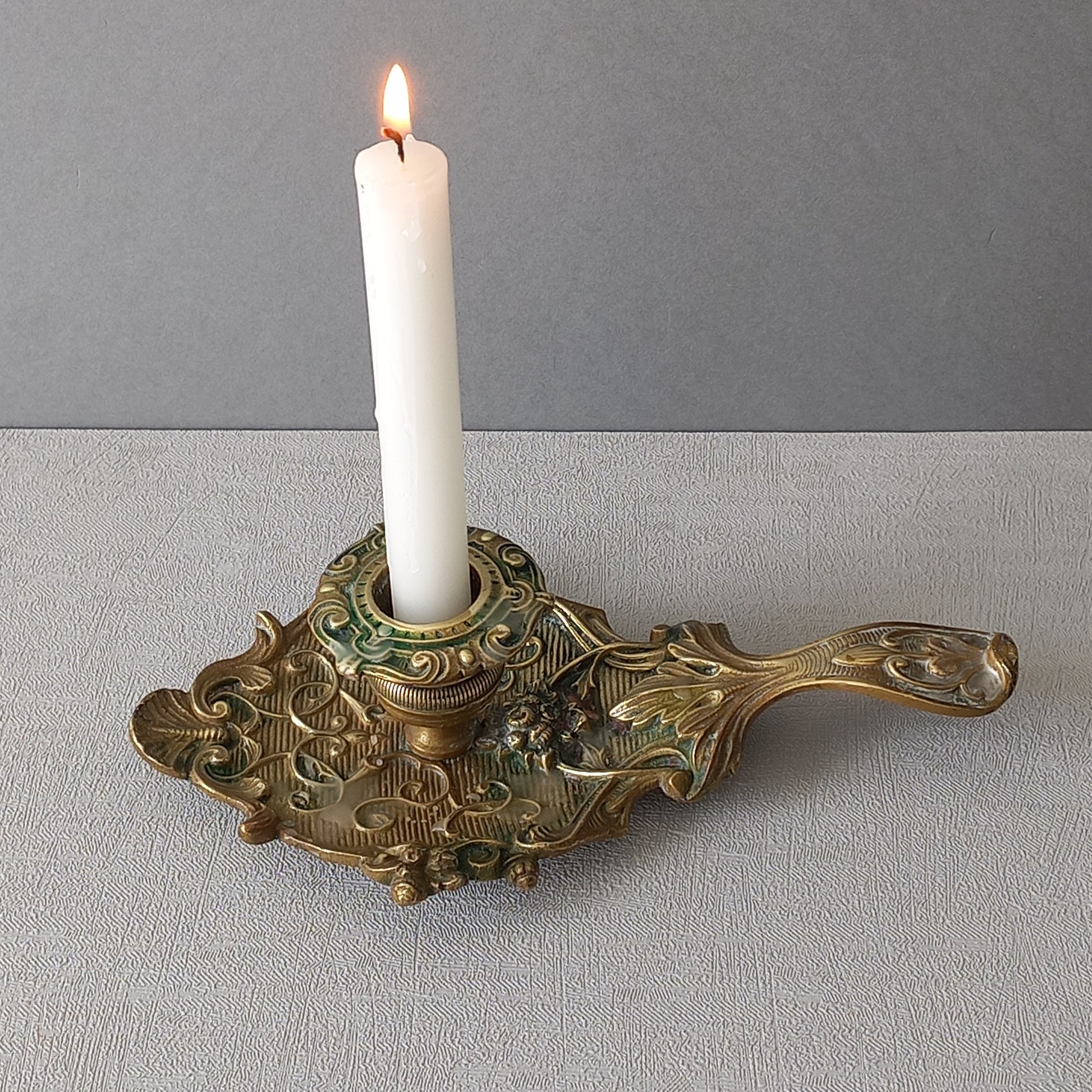 An original French art nouveau brass chamber stick, a small and decorative antique candle holder that will be a welcome addition to any interior.