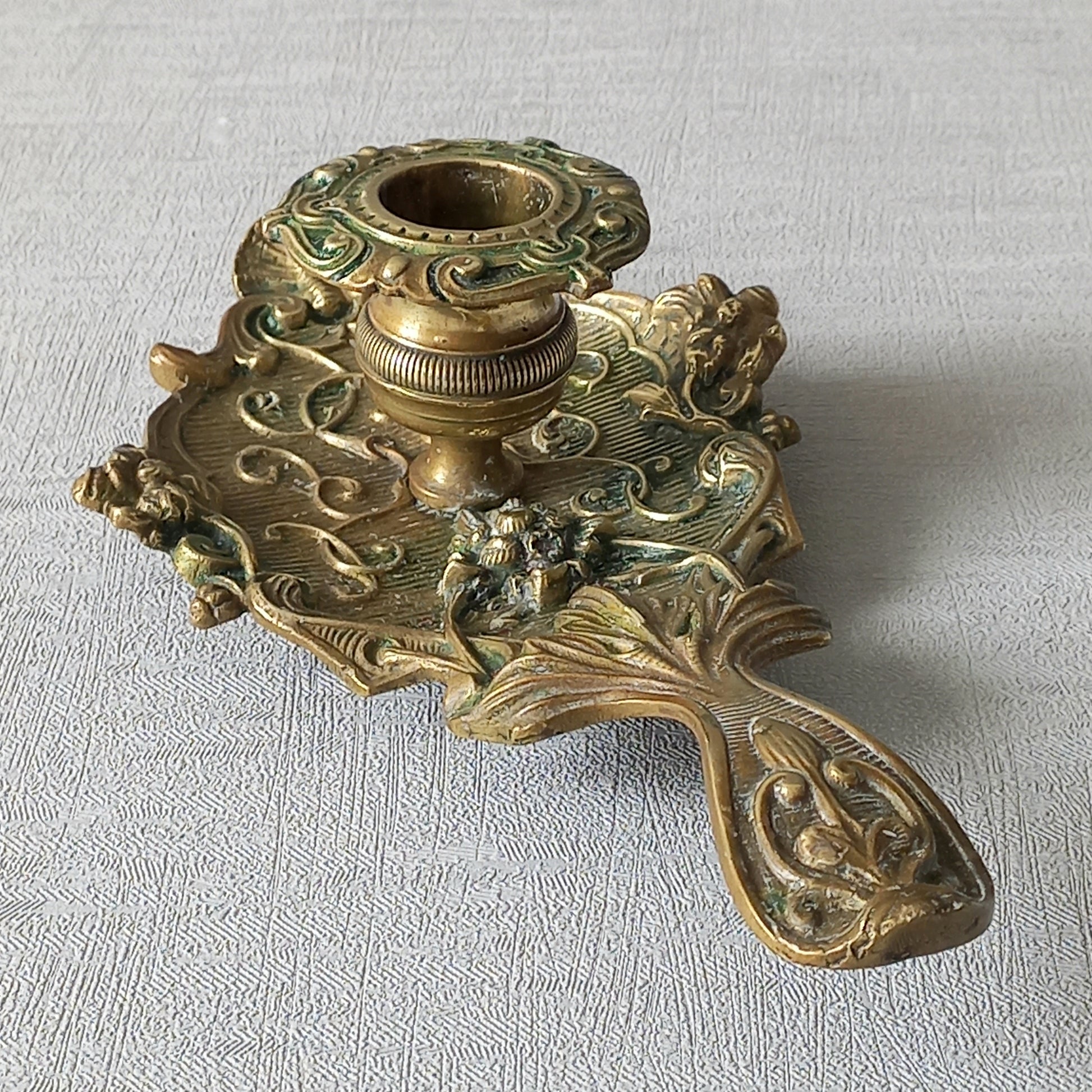 An original French art nouveau brass chamber stick, a small and decorative antique candle holder that will be a welcome addition to any interior.