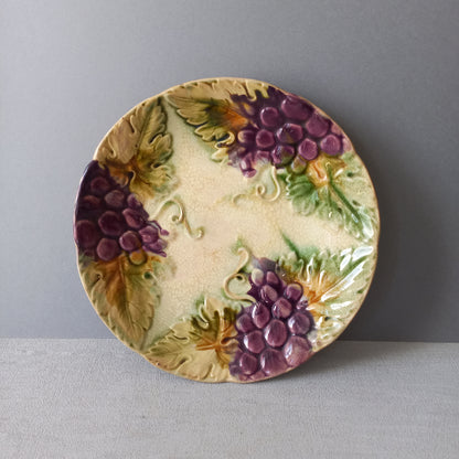 Small antique majolica wall plate with purple grapes from France, decorative home decor