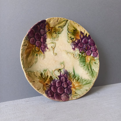 Small antique majolica wall plate with purple grapes from France, decorative home decor