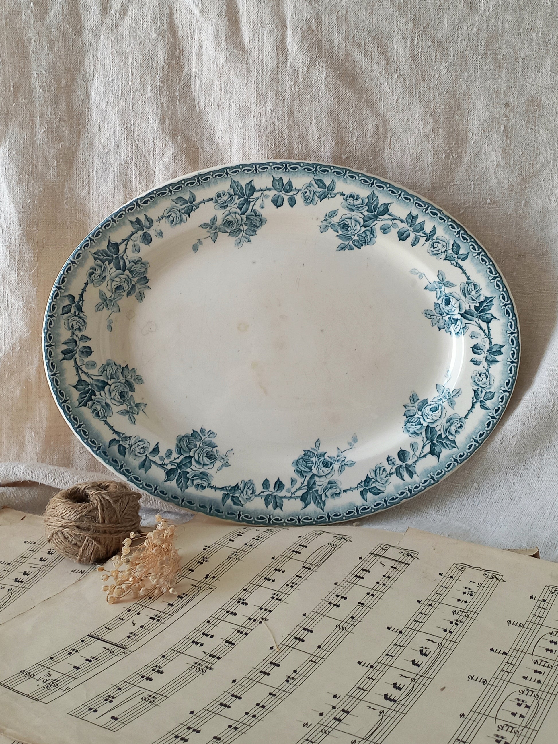 Small French antique oval plate/platter with a blue/green teal floral pattern. 