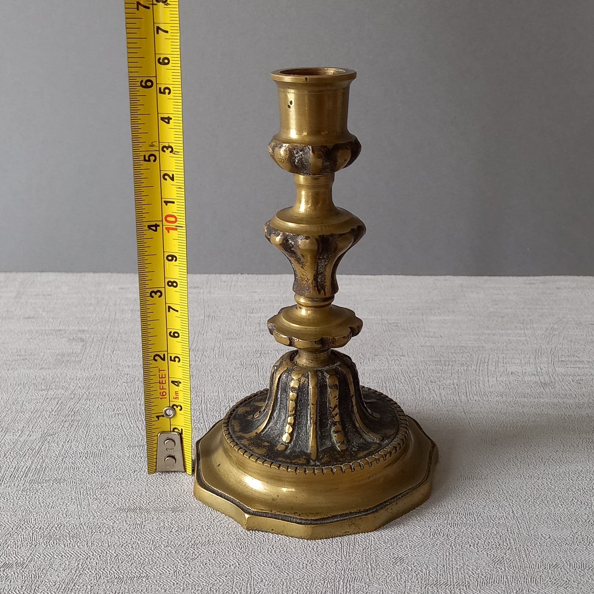 Small French vintage decorative brass bronze candle holder, a heavy piece for its size. Makes a very nice piece of practical home decor or is perfect as a vintage gift.