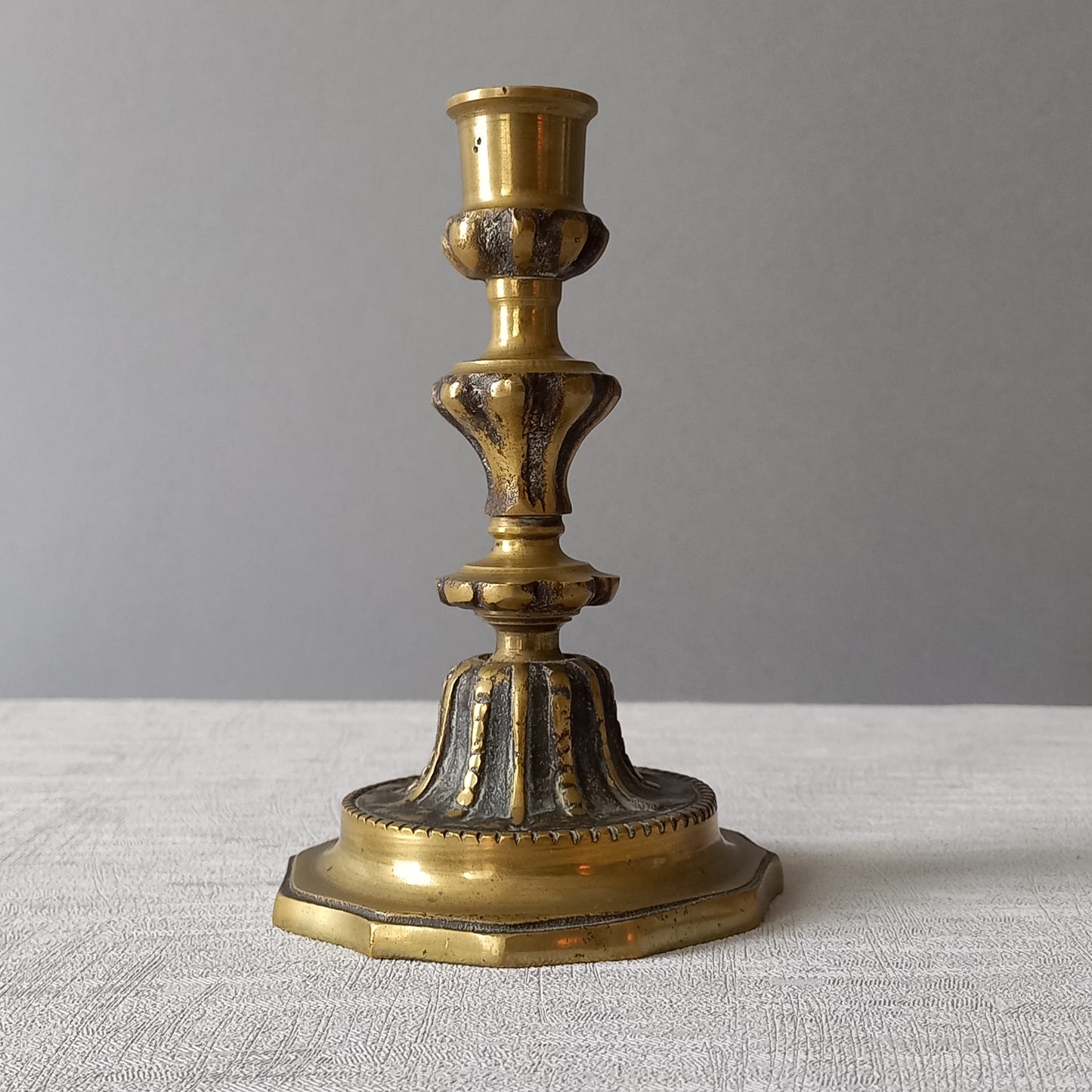 Small French vintage decorative brass bronze candle holder, a heavy piece for its size. Makes a very nice piece of practical home decor or is perfect as a vintage gift!