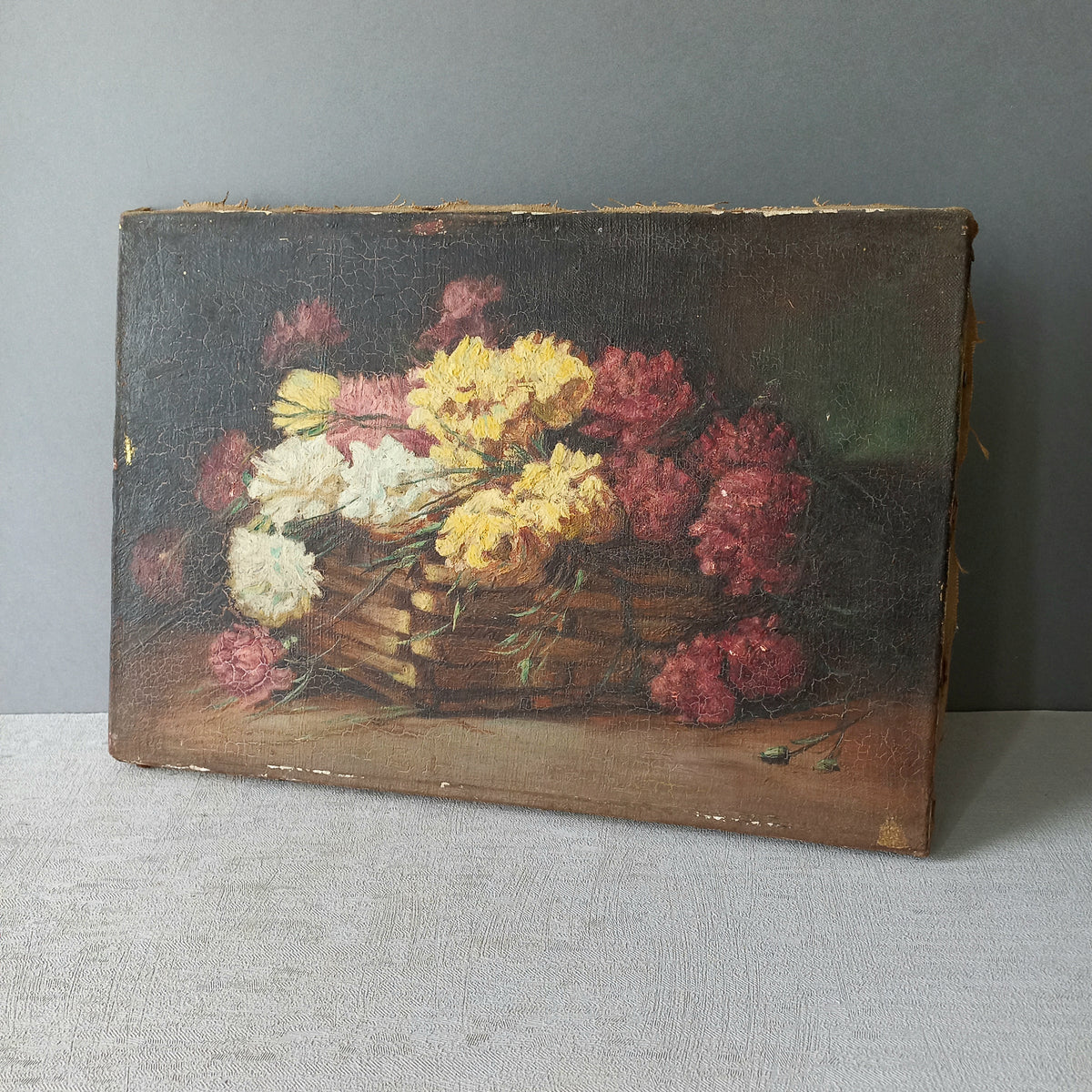 A stunning little French antique floral oil painting, really wonderfully painted with confident brush strokes. This piece is very old as you can see, especially when you view the rear of the canvas - there's a little label to the rear with a Paris mark - probably where the canvas originated.

In summary, beautiful and original antique art from France.