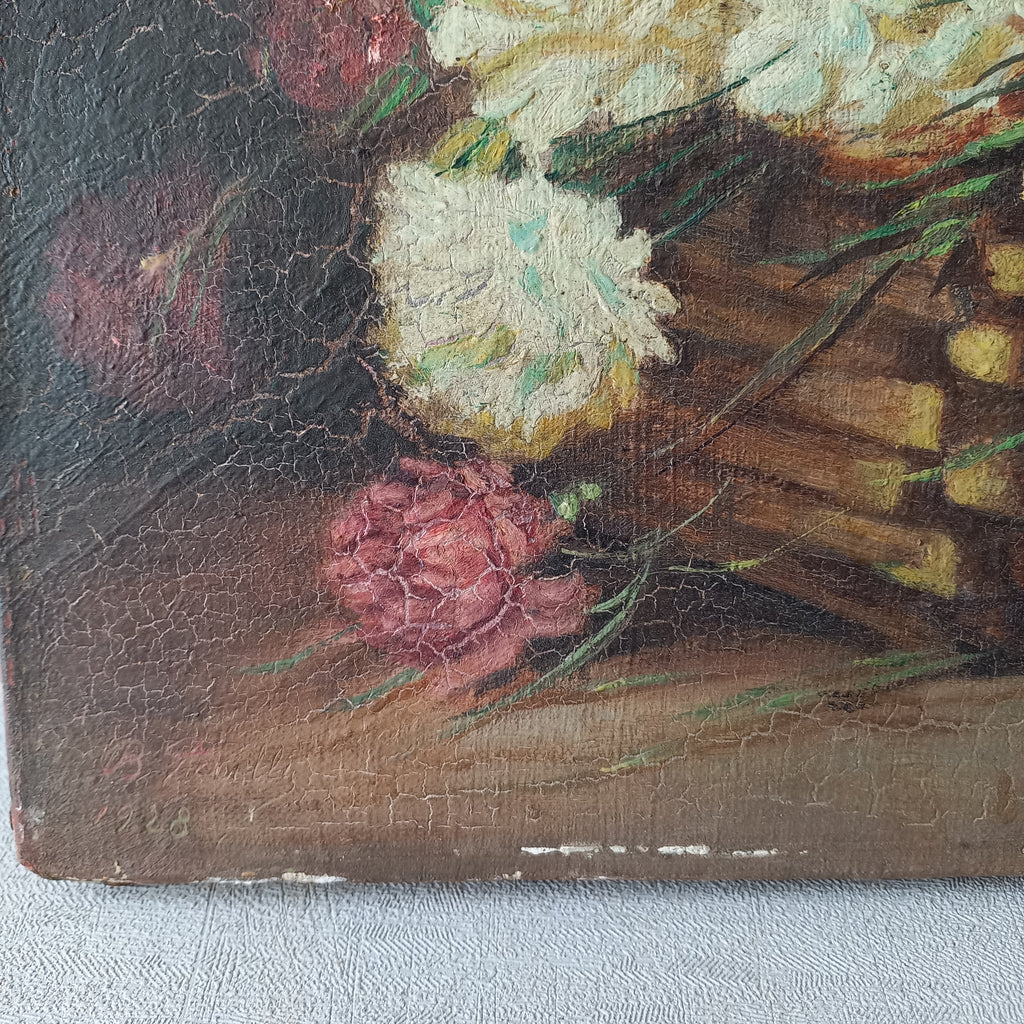 A stunning little French antique floral oil painting, really wonderfully painted with confident brush strokes. This piece is very old as you can see, especially when you view the rear of the canvas - there's a little label to the rear with a Paris mark - probably where the canvas originated.

In summary, beautiful and original antique art from France.