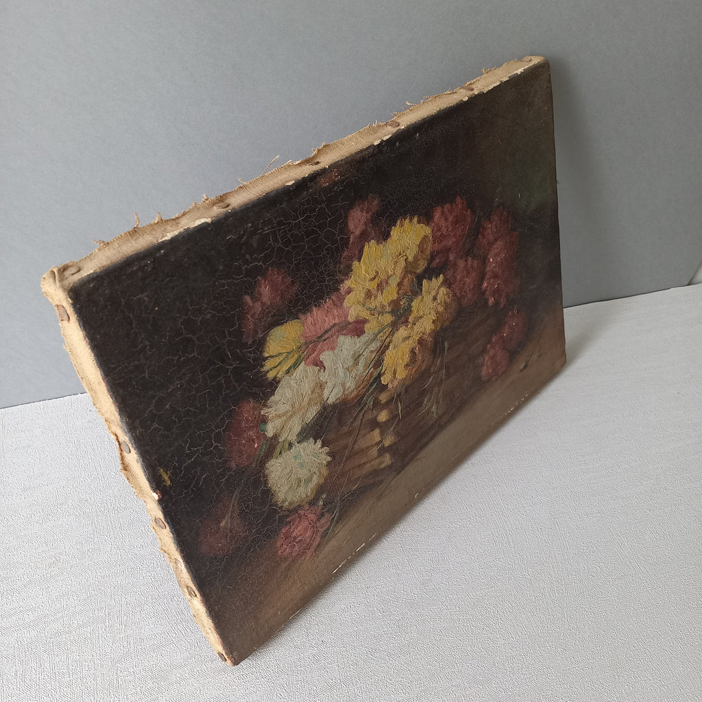 A stunning little French antique floral oil painting, really wonderfully painted with confident brush strokes. This piece is very old as you can see, especially when you view the rear of the canvas - there's a little label to the rear with a Paris mark - probably where the canvas originated.

In summary, beautiful and original antique art from France.