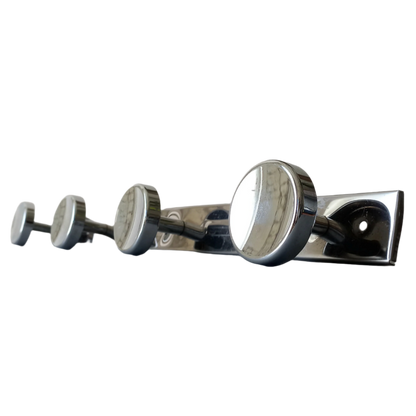 A stylish French vintage 4 peg metal coat rack with a polished finish, a great piece of practical wall decor for your home.