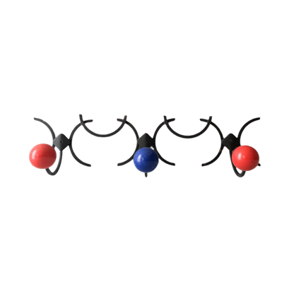 An original French vintage mid-century 'atomic' coat rack, a rare find these days and a wonderful piece of practical home decor. The black frame-work that holds the coloured pegs/balls is made from strong cast iron and there are two screw holes so that you can immediately fix the coat rack to your wall.