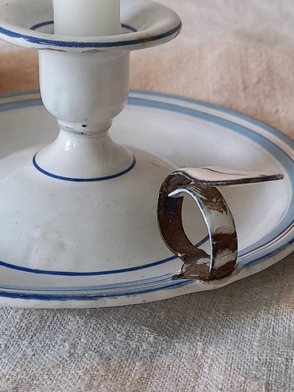 close-up of a vintage enamel candle holder
