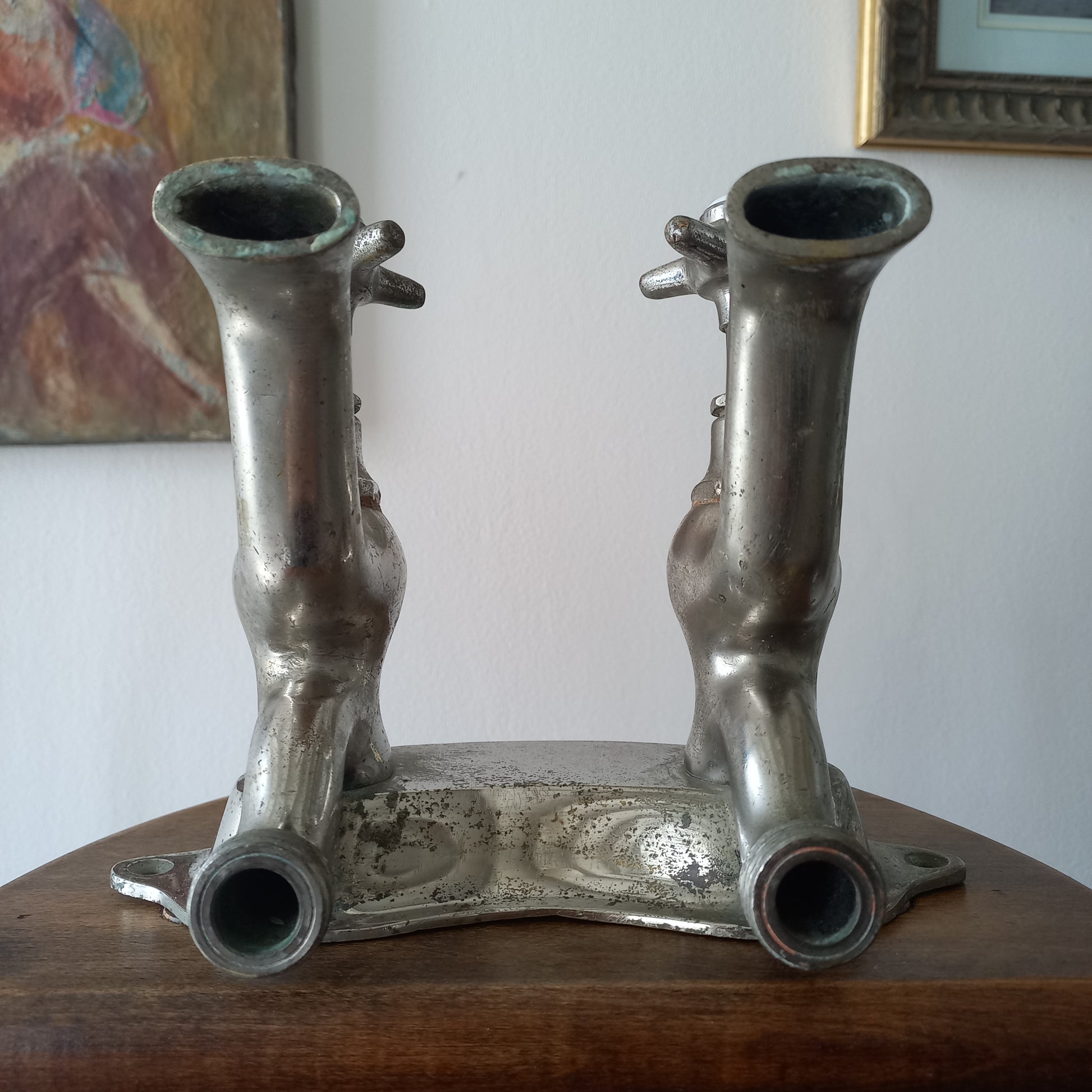 Vintage metal faucet on a wooden background