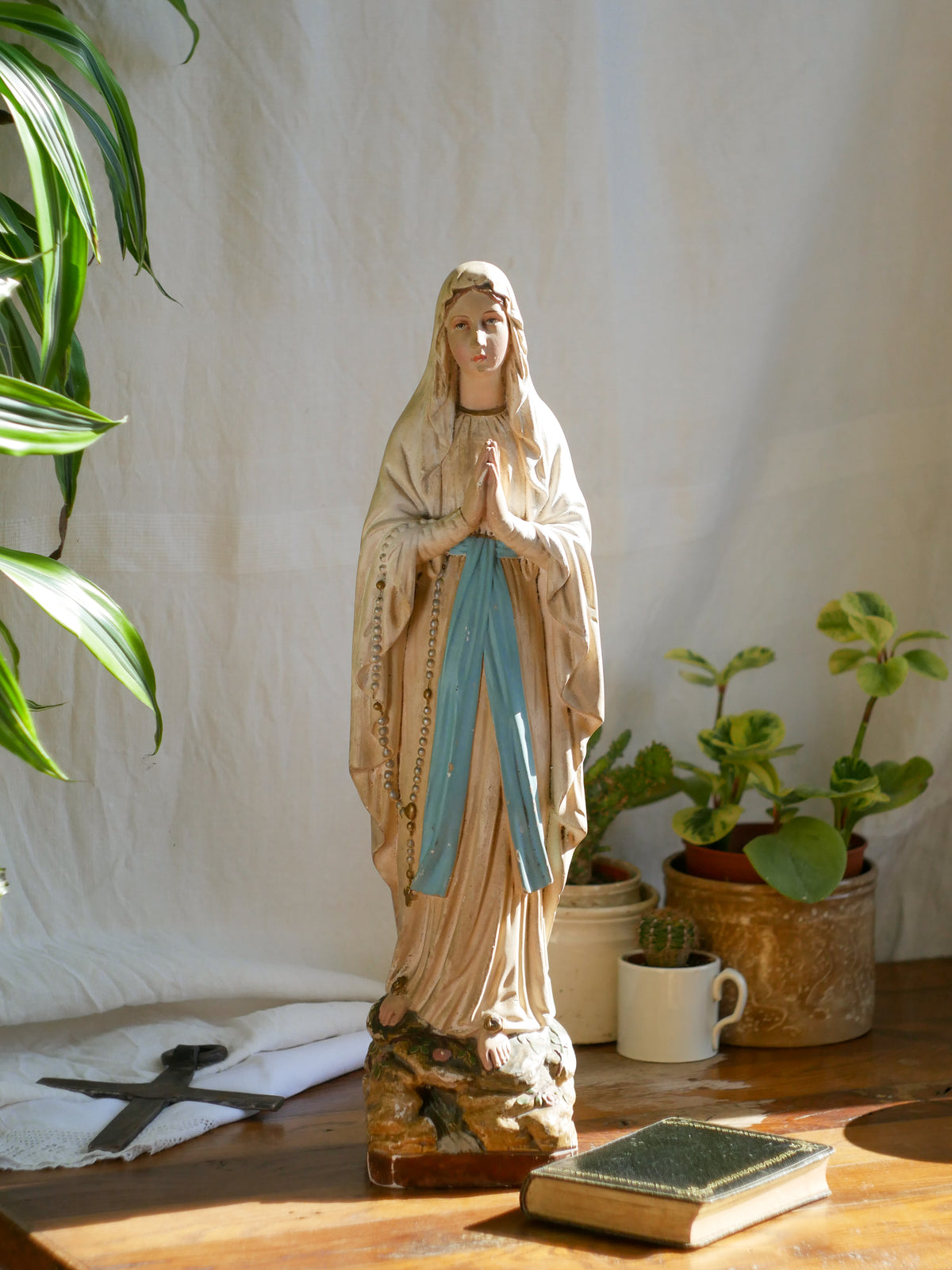 A large and stunning French vintage/antique religious Madonna figurine with wonderful subtle and time-faded coloring, a hard to find piece in this wonderful condition which has just the right amount of aging. This beautiful statue makes excellent religious decor in any home.