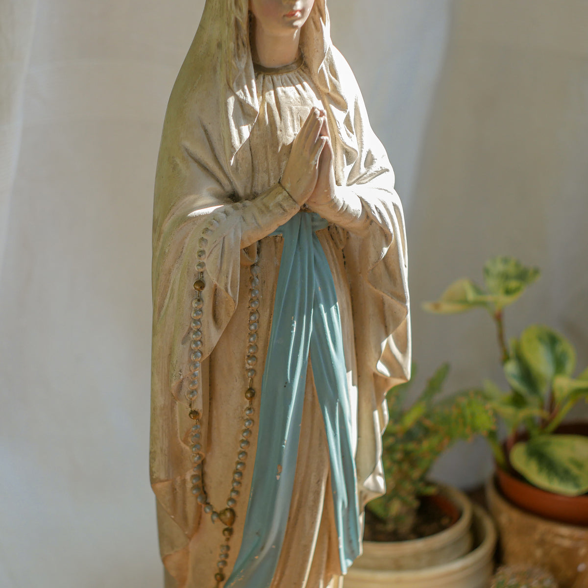 A large and stunning French vintage/antique religious Madonna figurine with wonderful subtle and time-faded coloring, a hard to find piece in this wonderful condition which has just the right amount of aging. This beautiful statue makes excellent religious decor in any home.
