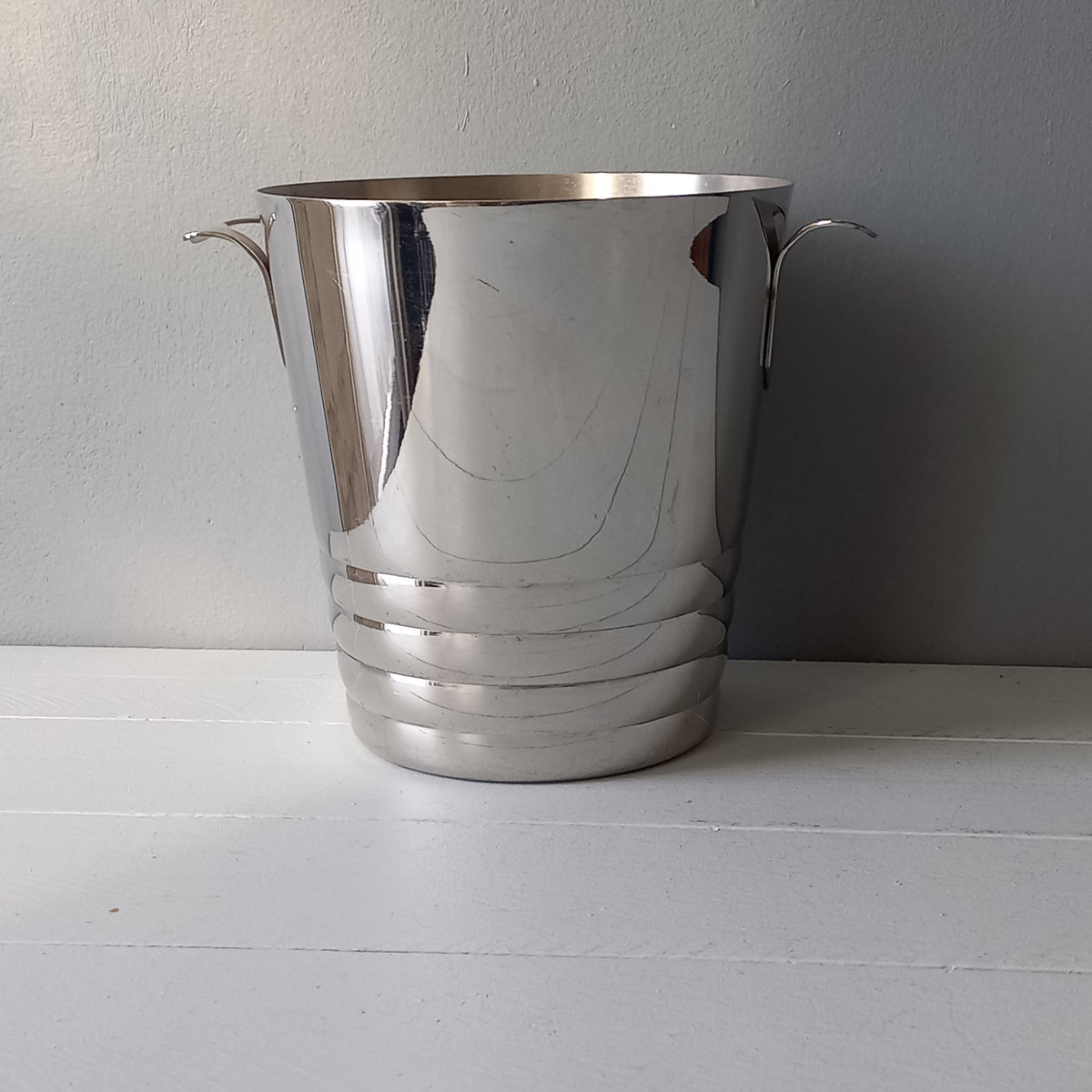A French vintage chrome metal art deco style champagne bucket, wine cooler or ice bucket, a heavy, quality piece.