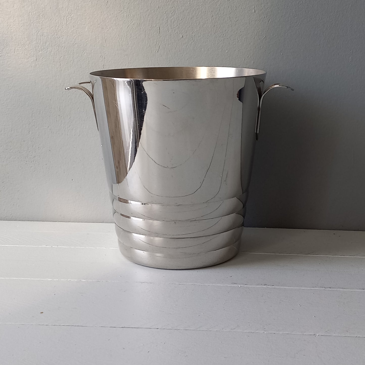 A French vintage chrome metal art deco style champagne bucket, wine cooler or ice bucket, a heavy, quality piece.