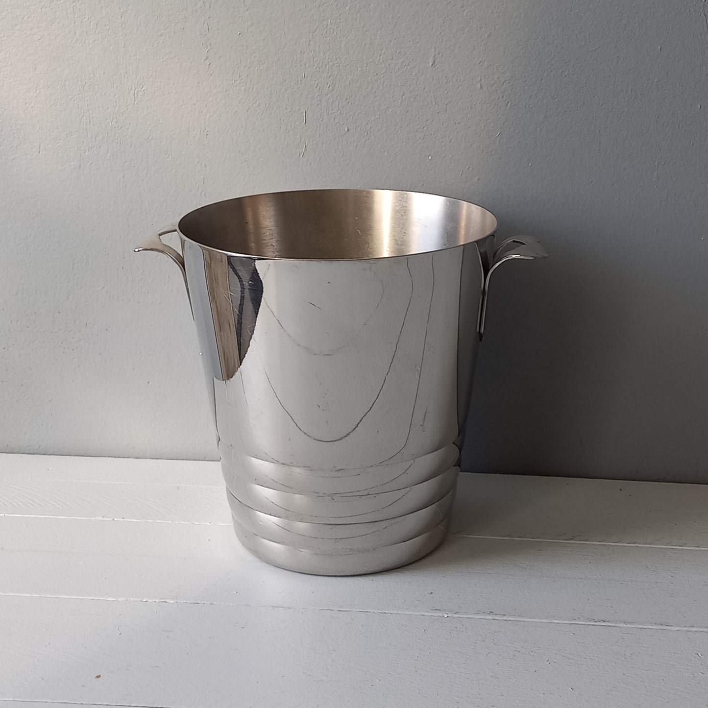 A French vintage chrome metal art deco style champagne bucket, wine cooler or ice bucket, a heavy, quality piece.