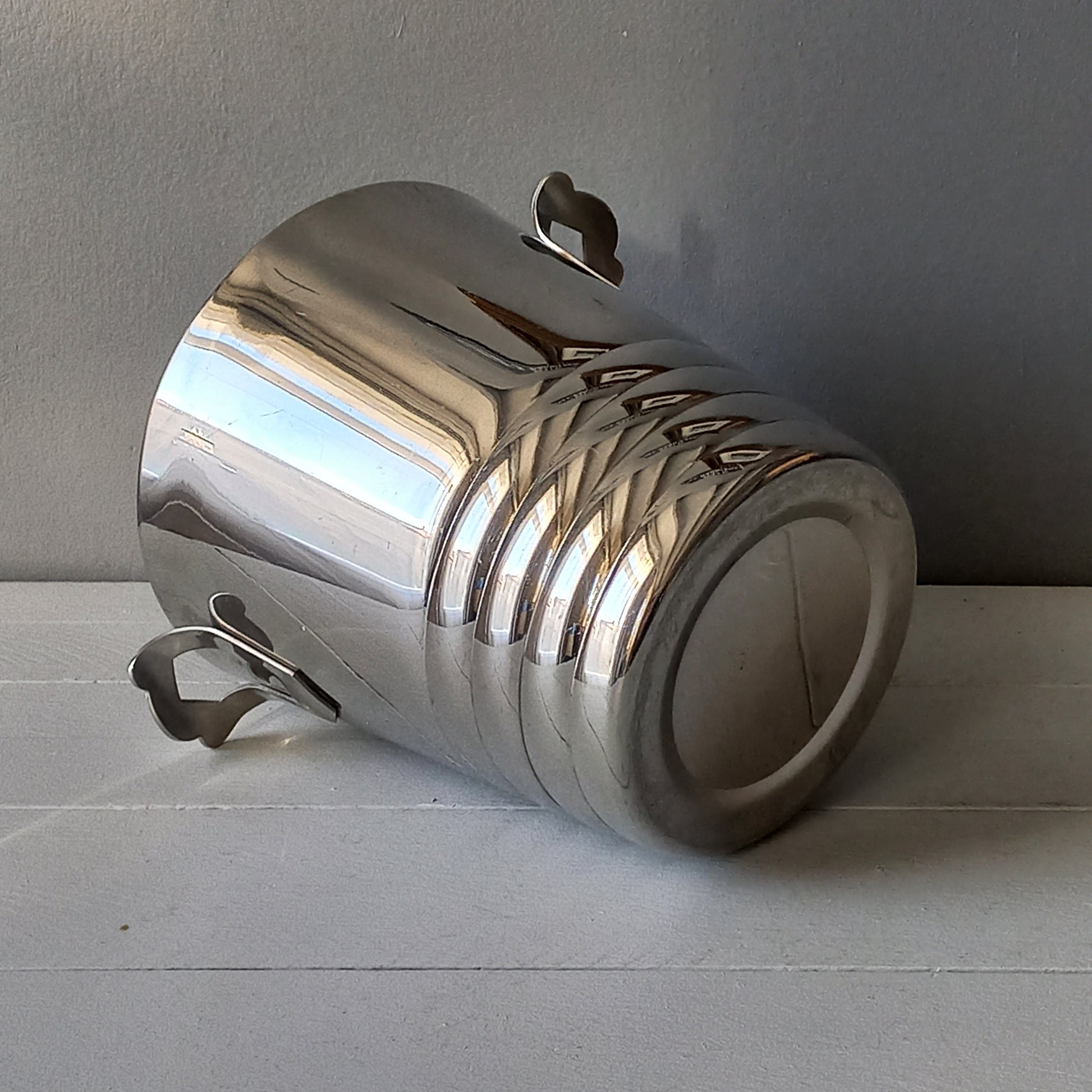 A French vintage chrome metal art deco style champagne bucket, wine cooler or ice bucket, a heavy, quality piece.