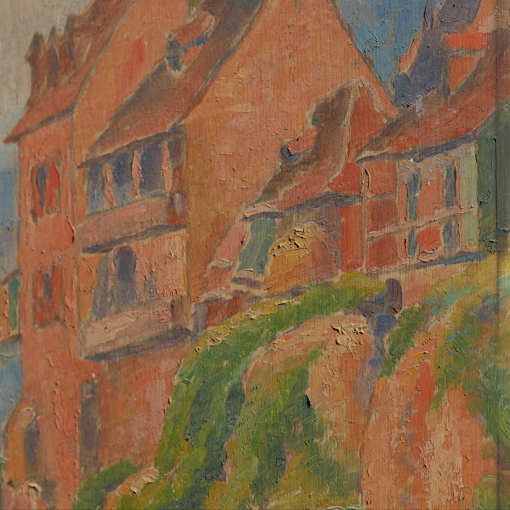 An original vintage oil painting depicting a village on the banks of a large river. It looks similar to the Rhine River Danube in Germany, and with the large hills/mountains in the background maybe the Black Forest, although it could be many places in Europe and perhaps even in France where we purchased this wonderful piece of original art on wooden board.