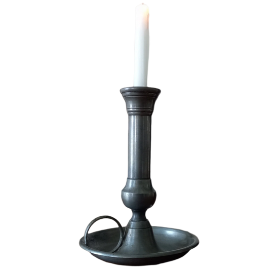 A handsome French vintage pewter candle holder / chamber stick that makes excellent home decor. This chamber stick is taller than similar ones we usually find. Underneath is marked with the manufacturer's stamp - a great looking piece!