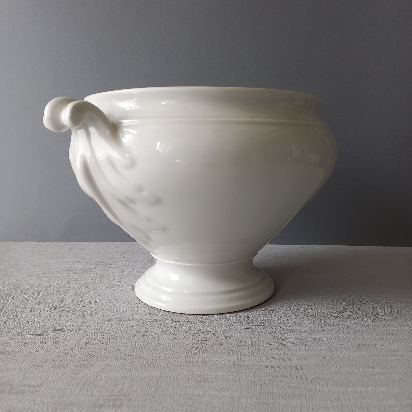 A large French vintage white lidless tureen with glorious oak leaf handles, a heavy and quality tureen that is perfect as a fruit bowl.