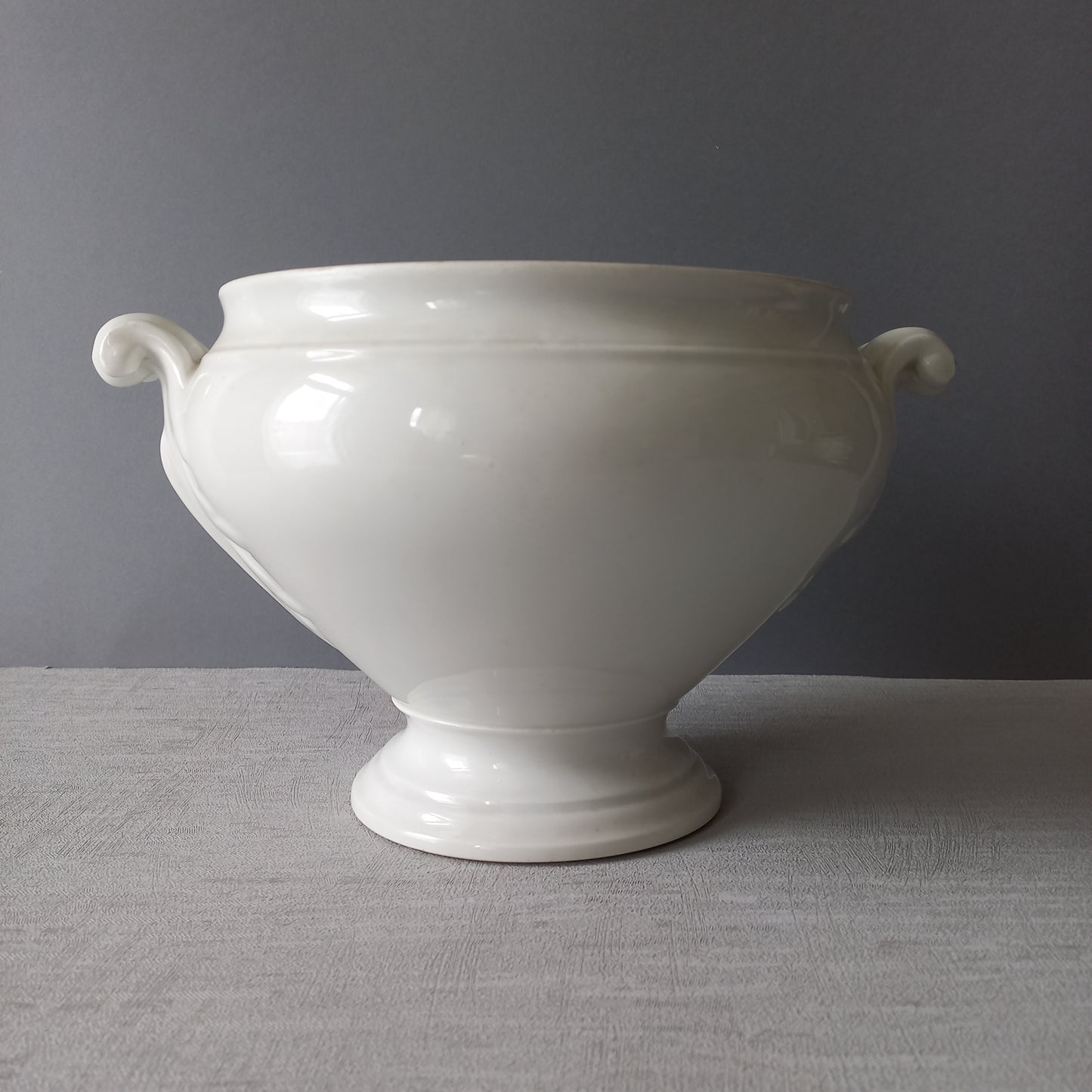 A large French vintage white lidless tureen with glorious oak leaf handles, a heavy and quality tureen that is perfect as a fruit bowl.