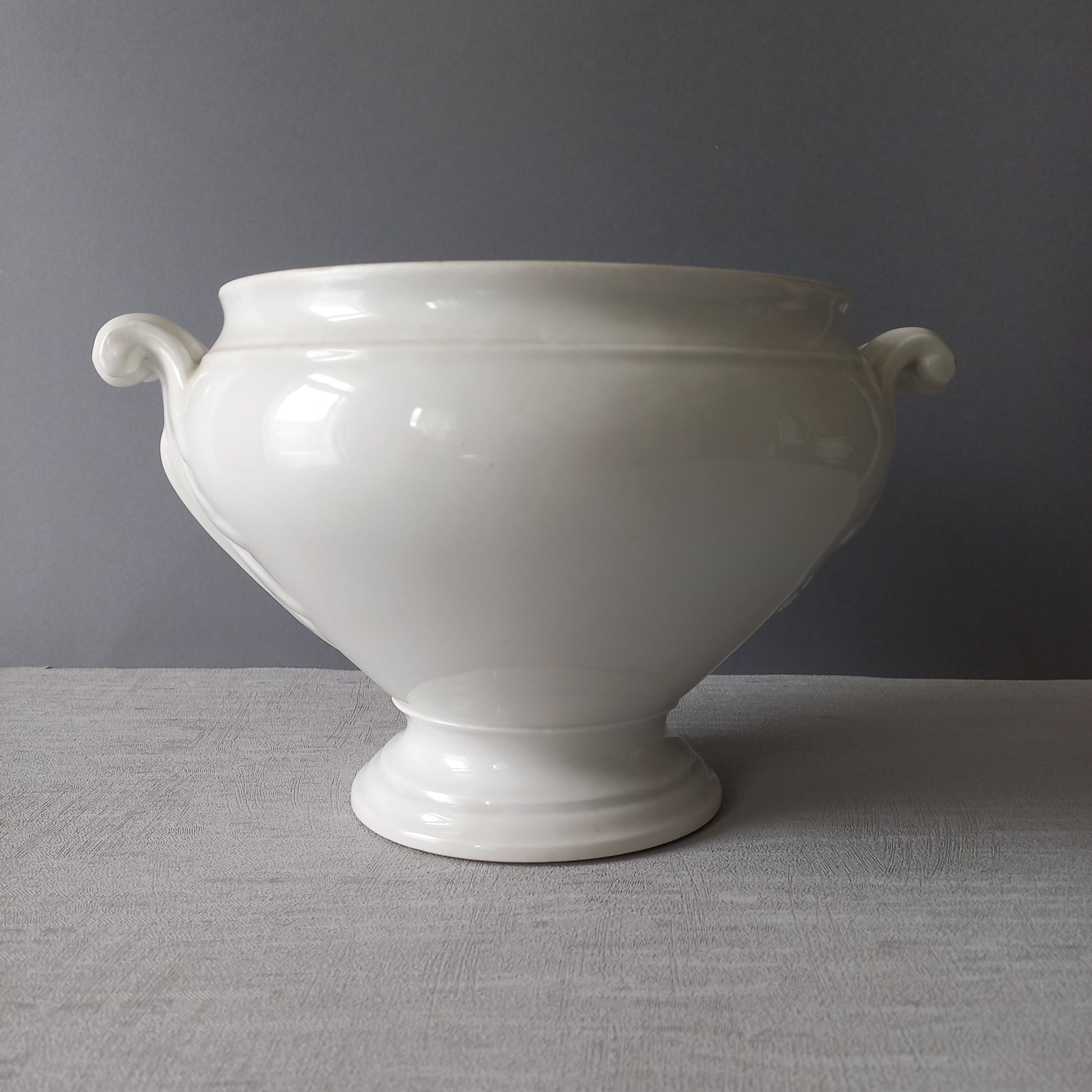 A large French vintage white lidless tureen with glorious oak leaf handles, a heavy and quality tureen that is perfect as a fruit bowl.