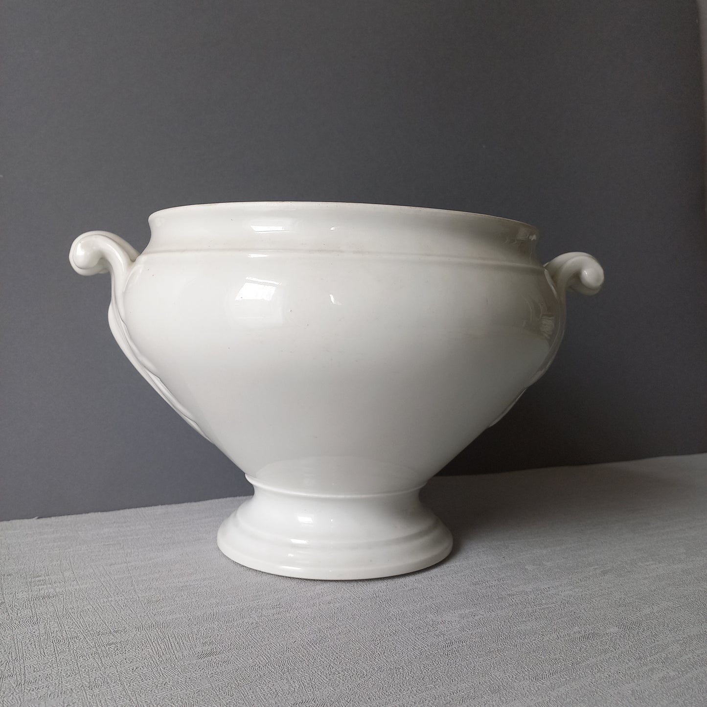 A large French vintage white lidless tureen with glorious oak leaf handles, a heavy and quality tureen that is perfect as a fruit bowl.