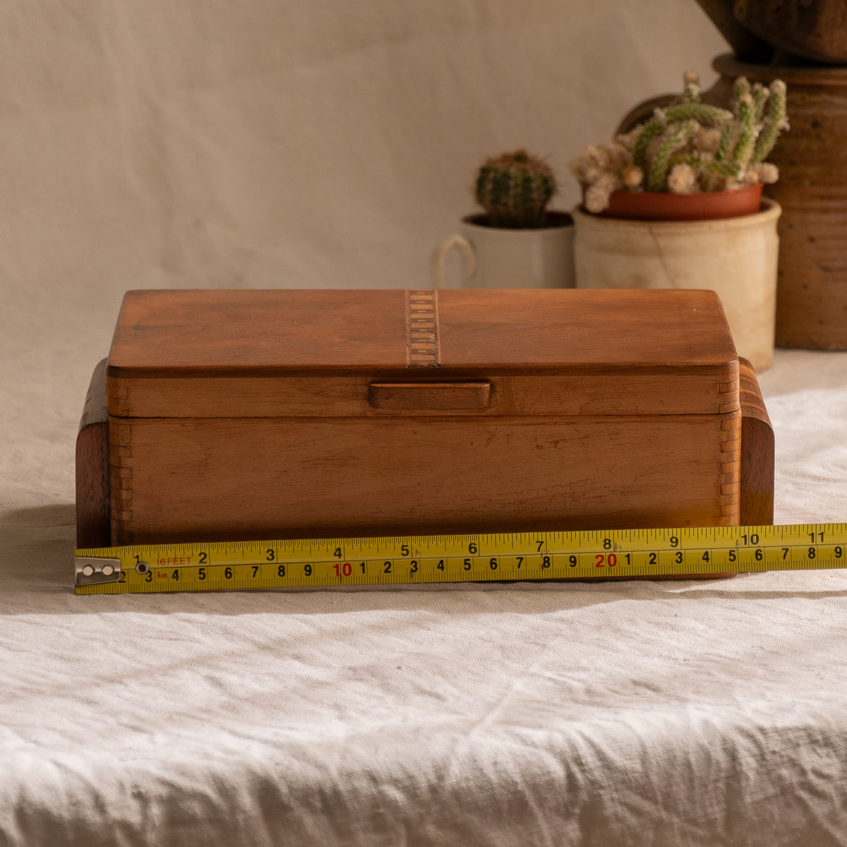 A beautiful French vintage wooden box, a hand-made piece with dove-tailed joints and inlaid design pattern - the colour of the wood is a wonderful golden brown and the hinges are strong. In summary a beautiful vintage box which makes an attractive piece of practical home decor.