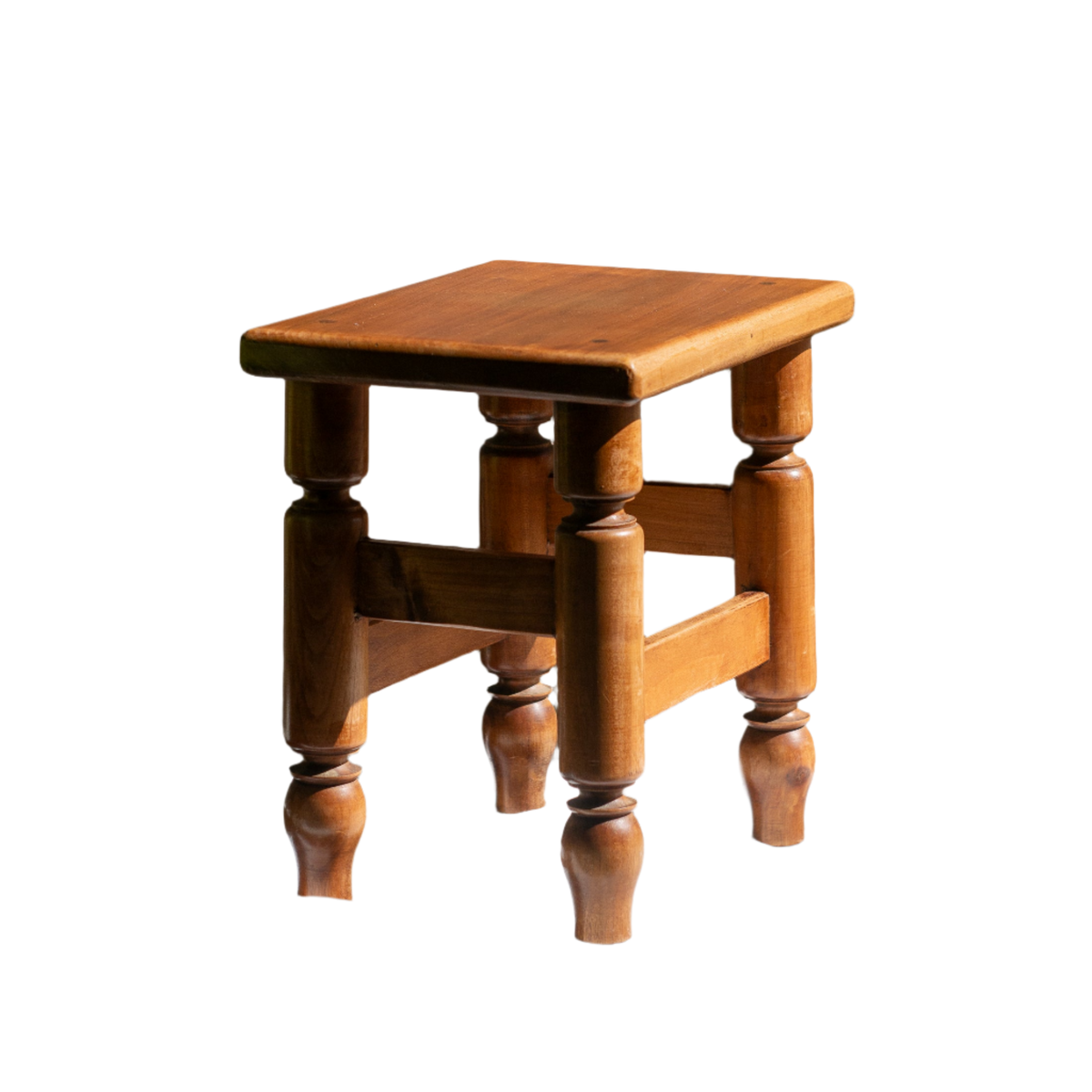 A handsome vintage French wooden stool in a lovely shade of honey-coloured brown. This old stool is very solid and would make a great plant stand (we currently use one on our desk as a plant stand and it looks great!) and many other decorative possibilities.