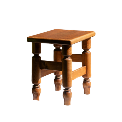 A handsome vintage French wooden stool in a lovely shade of honey-coloured brown. This old stool is very solid and would make a great plant stand (we currently use one on our desk as a plant stand and it looks great!) and many other decorative possibilities.