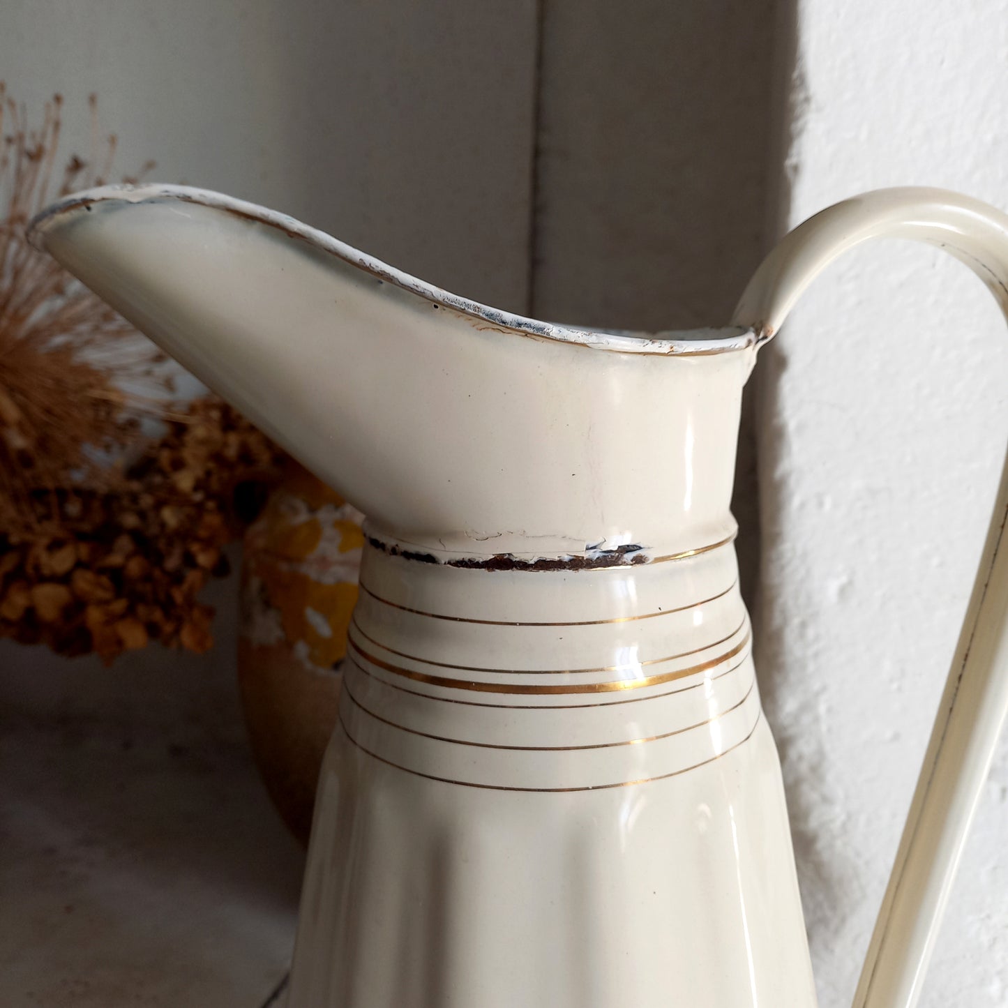 Large antique enamel pitcher in antique cream color with gold trim from France, large enamel jug, country kitchen and farmhouse decor